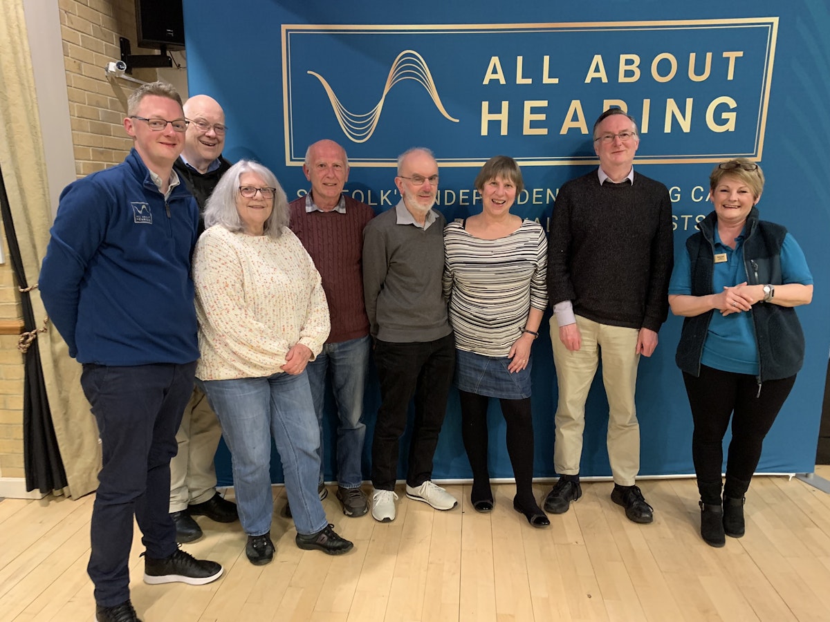 All About Hearing Directors, Matthew Coward and Karen Finch with quiz winners from April 2024